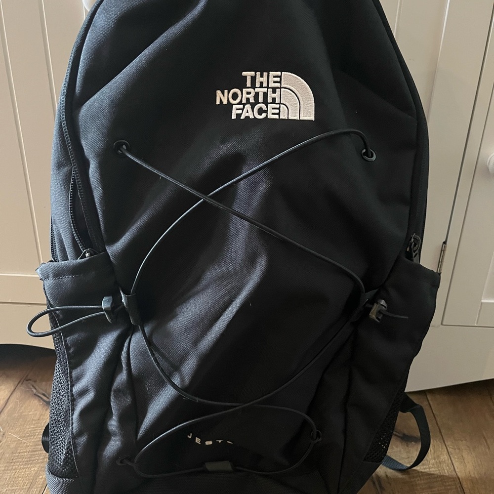 The North Face Black Backpack with Durable Material and Padded Straps
